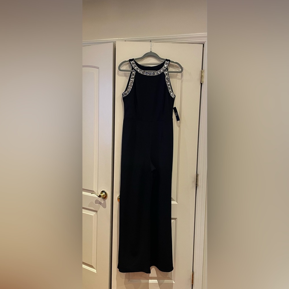 Black sleeveless jumpsuit